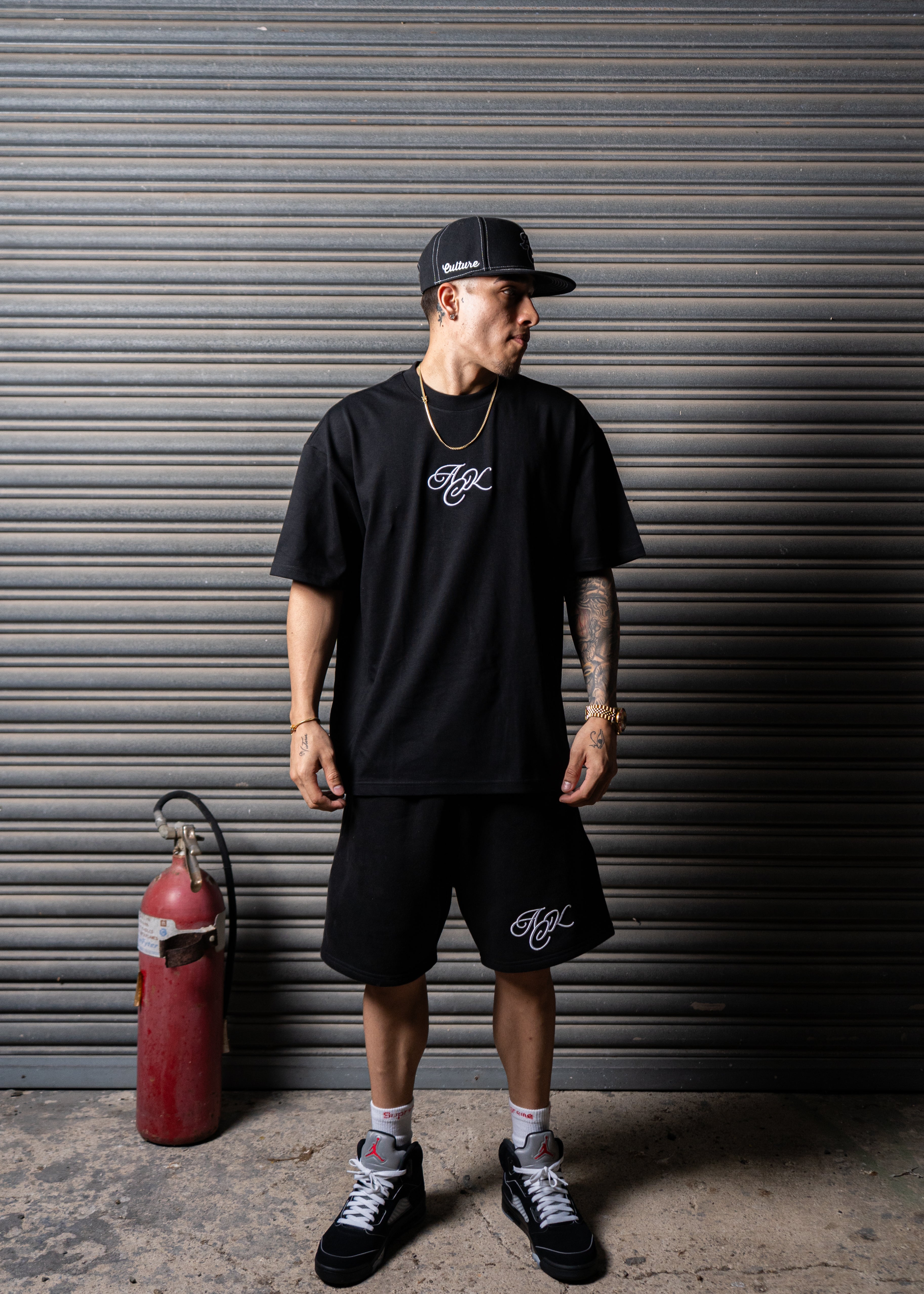 AC Cursive Short